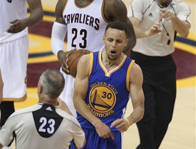 Curry fined, not suspended for throwing mouthguard at fan