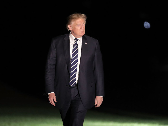 Senator says WH economic adviser faked a bad connection to get Trump off the phone