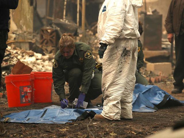 Rescuers in California wildfires search for remains, continue battling blazes